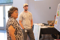 Southern Ute Vice Chairman, Ramona Eagle converses with employees of the Water Resources division during the DNR Open House event on Wednesday, June 8. Visitors received free handouts, small goods, and a free lunch.  