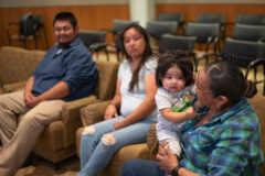 Southern Ute tribal member Nicole Lansing holding her grandson Tavach Randall Litz during a request for enrollment given at the Tribal Council Regular Meeting held on Tuesday, June 7, in Council Chambers. Tribal Council welcomed Litz as a new enrollee and congratulated his parents, Alyssa Nez and Leandro Samuel Stacy Litz, at the conclusion of the new enrollment.  