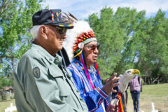 Southern Ute Veterans Association Commander, Howard Richards Sr., stands aside Ute Mountain Ute Veteran, elder and spiritual leader, Terry Knight, prior to Knight giving the invocation at the Ouray Memorial Cemetery.
