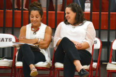 Ignacio Volleyball head coach Shasta Pontine (right) cracks a pre-match joke with assistant/JV coach Cindy Valdez inside IHS Gymnasium during the Fall 2021 season. The two will return to guide the postseason-minded Volleycats in 2022.
