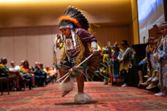 Ute Mountain Ute tribal member, Darion “Shark” Keeswood, shows off his dance style to onlookers and fellow dancers. 