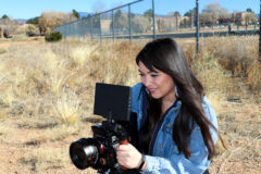 Native Lens Lead Editor, Charine Gonzales (San Ildefonso Pueblo) on location filming.