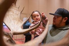 Avalina Frost grips her aunt's bull moose antlers during the Membership Outreach and Scoring Night event at the Sky Ute Casino Resort. Tribal members were encouraged to bring in their trophy animals to get officially scored, Wednesday, March 22. The last time the Wildlife Division held a scoring night was in 2019 prior to the COVID-19 pandemic.