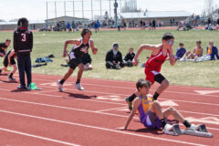 Southern Ute tribal member Keevin Reynolds from Escalante Middle School gets off the blocks quickly as he strides to catch Juda Ashley of Ignacio Middle School in the 200-yard dash at the Bayfield Middle School track meet on Saturday, April 22 in Bayfield, Colo.