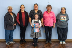 Members of the Southern Ute Multi-Purpose Facility Powwow group stand for a portrait, pictured left to right, Connie Baker, Elise Redd, Rhonda Wilbourn, her daughter Kellis (center), Ramona Eagle and Terry Box.   