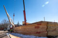 Thumbnail image of Sherman Construction works in tandem with Head Crane service out of Bayfield, Colo. to set trusses on Monday, Feb. 12 — rescheduled from the previous week due to winter weather conditions.