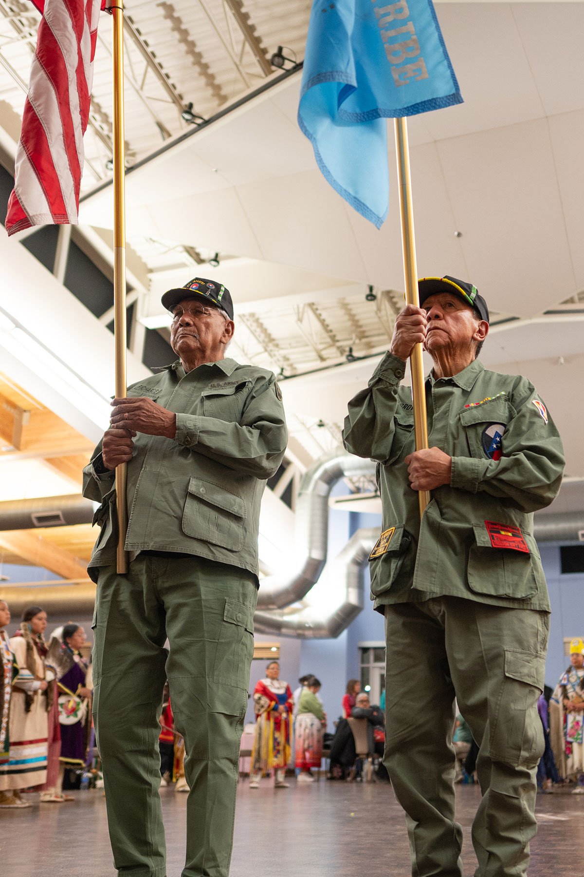 Southern Ute Veterans Association members Howard Richards Sr. and Rod Grove bring in the colors during Grand Entry of the MPF Valentine’s Powwow.