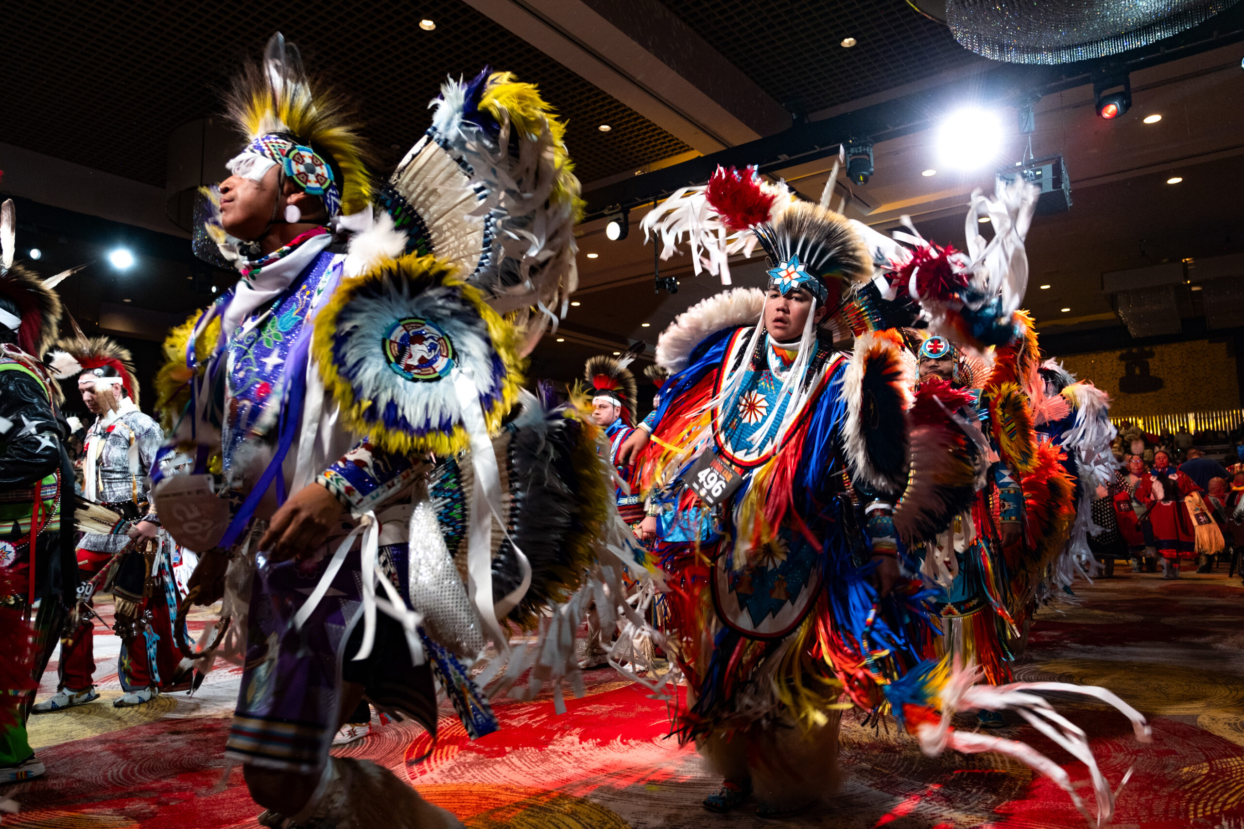 Dancers make their way into the arena during the 51st annual Seminole Tribal Fair and Powwow, Friday, Feb. 9 at the Seminole Hard Rock Casino in Hollywood, Fla.