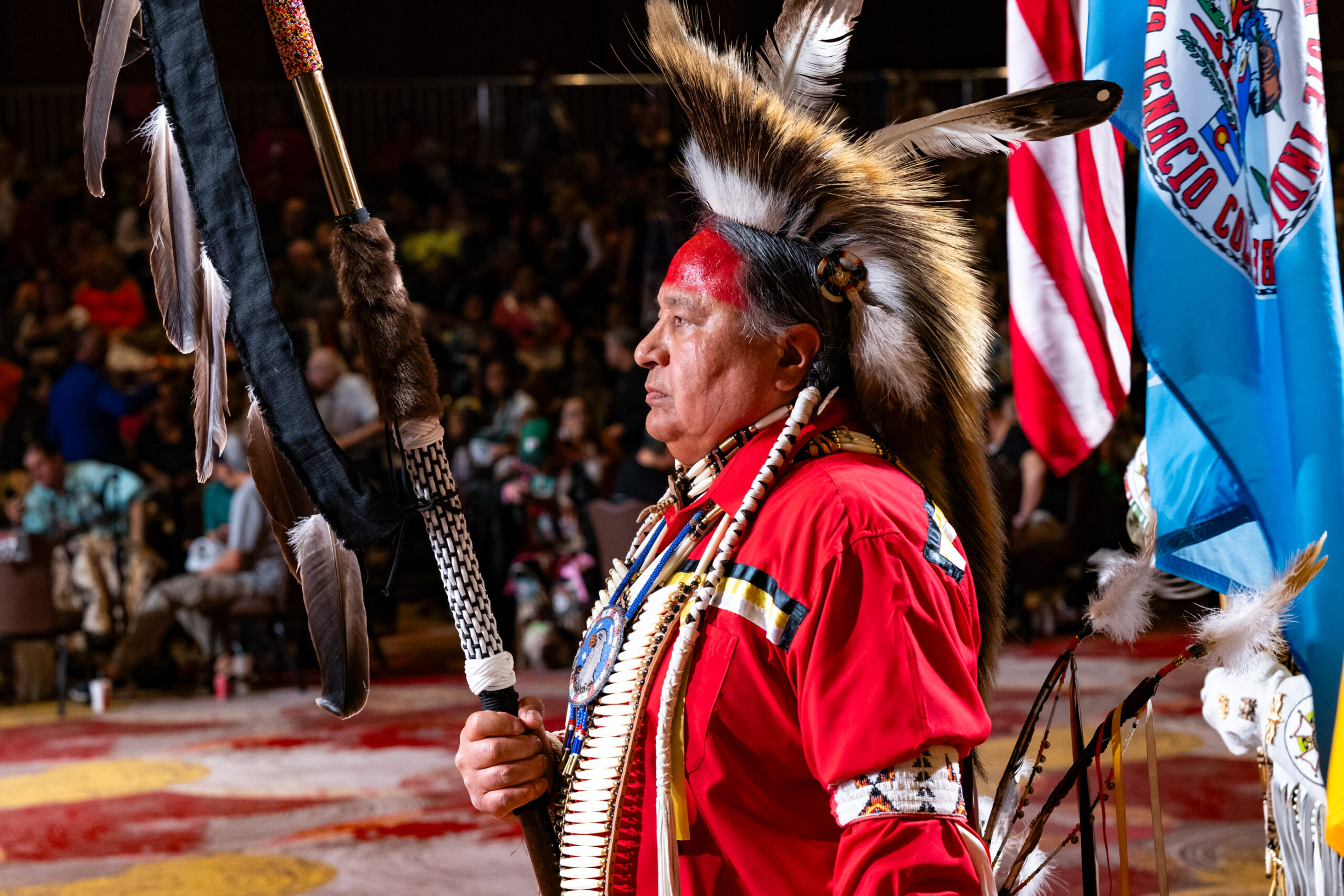 Southern Ute Veterans Association treasurer, Bruce LeClaire (U.S. Army), brings in the Eagle Staff during Grand Entry at the 51st annual Seminole Tribal Fair and Powwow in Hollywood, Fla. — the powwow brought Native Color Guards from across Indian Country for the “Battle of the Guards” contest special on Saturday, Feb. 10.