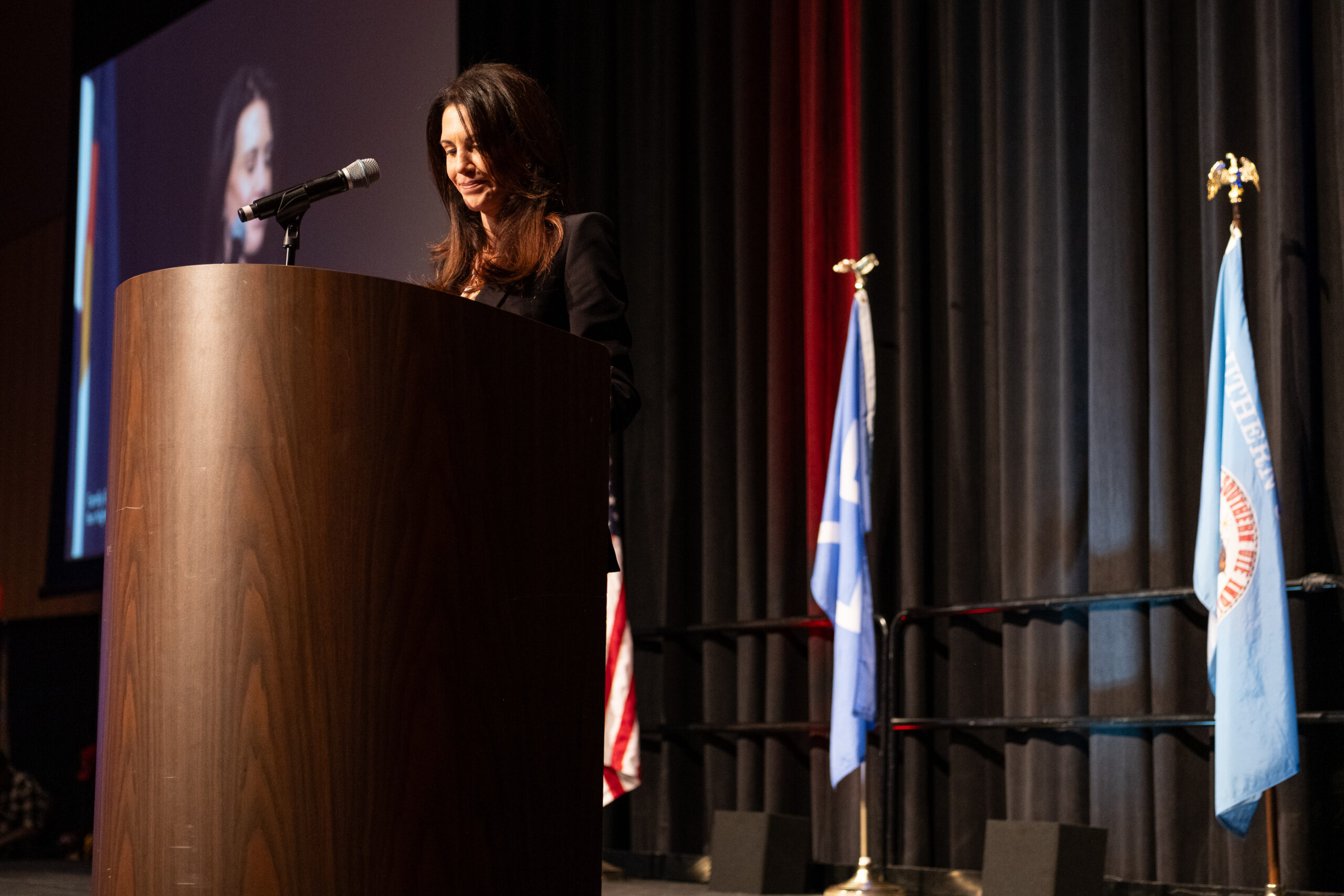 Shanan Campbell gives the eulogy for her father, at the Sky Ute Casino in Ignacio, Monday, April 13.