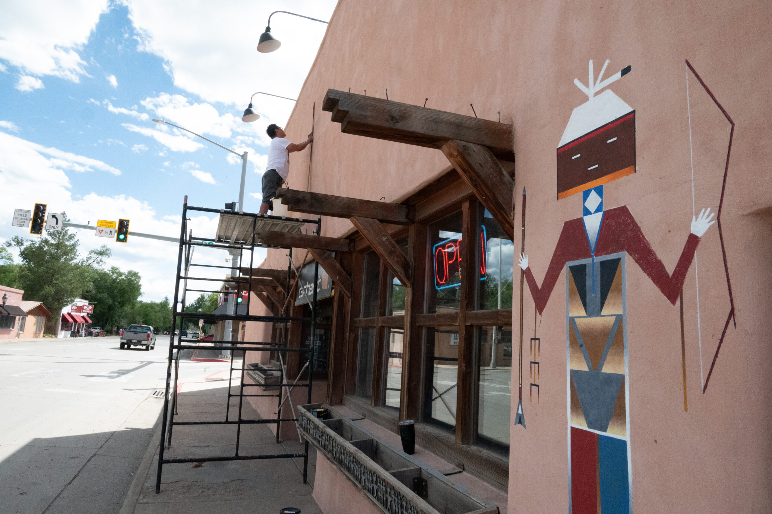 Joe repaints Waci-Ci mural
